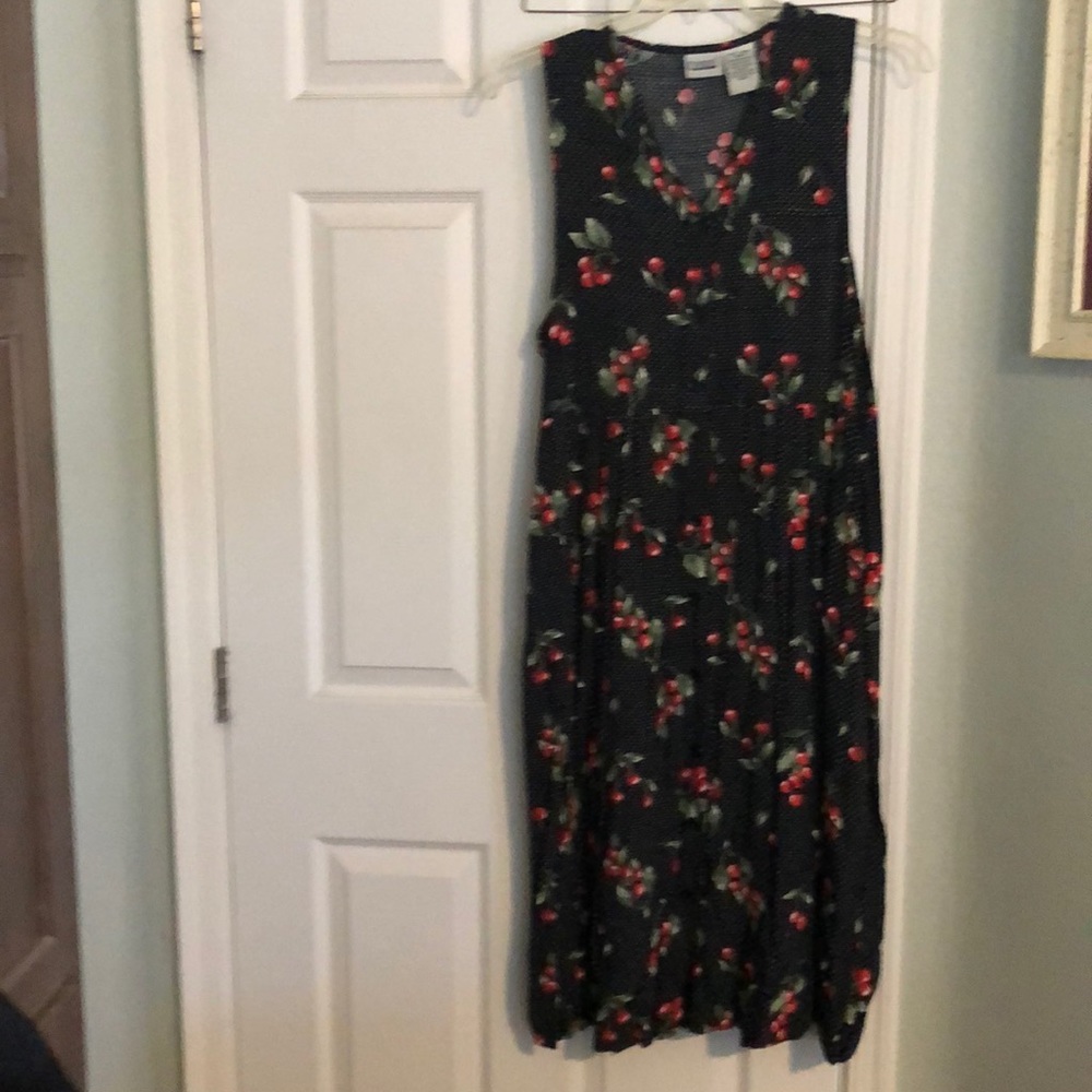 Cute rockabilly style cherry and polka dot dress. Buttons all the way up front